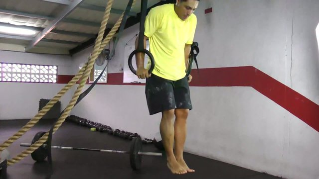 Muscle up to hold crossfit exercise