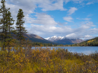 Fototapeta premium Fall mountain landscape of Lapie Lake Yukon Canada