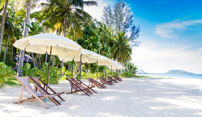 Chairs and umbrella on stunning tropical beach, Thailand
