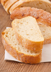 slices of white bread on a wooden table