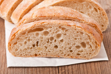 slices of white bread on a wooden table