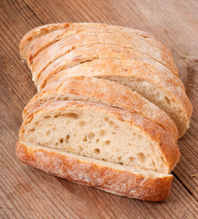 slices of white bread on a wooden table