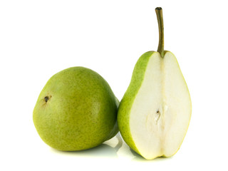 Ripe green pear with half on white background.