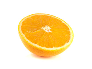 Slice of half ripe orange isolated on white