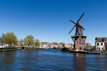 Fototapeta na wymiar Haarlem, windmill upon the waterfront