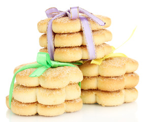 Sweet cookies tied with colorful ribbons isolated on white