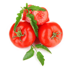 Ripe tomatoes isolated on white.