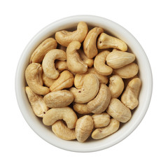 Cashew nuts in a bowl isolated on white background