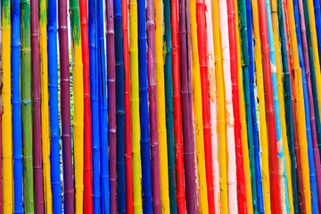 Abstract texture of dyed bamboo sticks.