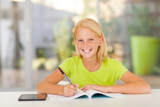 Cute Teen Girl Doing Homework