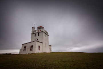 Fototapeta na wymiar lighthouse on the top of the hill