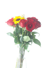 Fototapeta premium bouquet of red roses and sunflowers