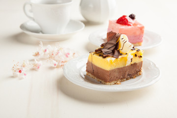 Cream pastries with chocolate and strawberries