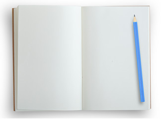Open notebook with blue pencil isolated on white.