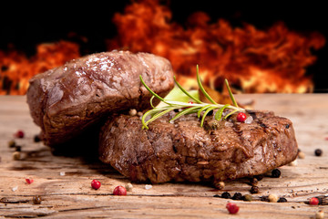 Grilled steaks on wood 