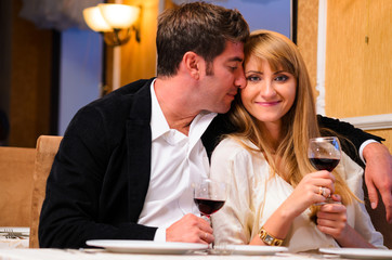 couple is sitting at restaurant