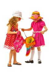 Two girls are dressed for summer