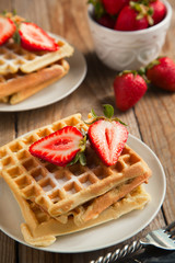 Waffles with strawberries for breakfast