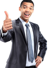 Happy businessman with thumbs up gesture