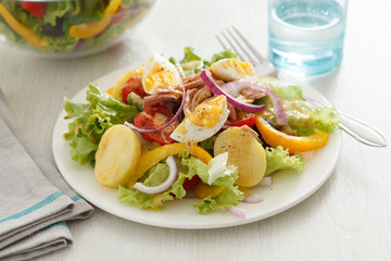 Salad nicoise. Tuna, eggs, potatoes, green beans, tomatoes