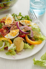 Salad nicoise. Tuna, eggs, potatoes, green beans, tomatoes