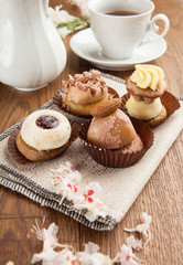 Pastries with chocolate and cream with tea