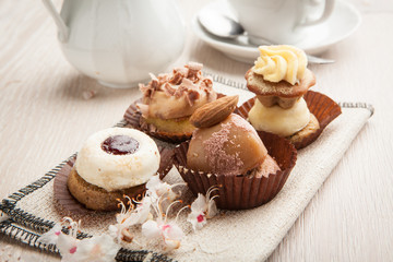 Pastries with chocolate and cream with tea