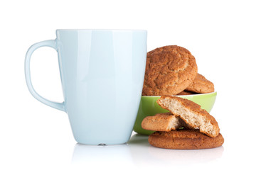 Milk cup and bowl with cookies