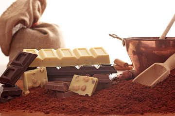Fototapeta cioccolato al latte e fondente e cacao su sfondo bianco obraz