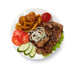 fried spare ribs with potatoes and vegetables