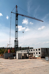 Fototapeta na wymiar Building site with crane