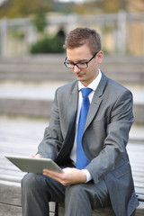 Business Man Using Touch Screen Tablet