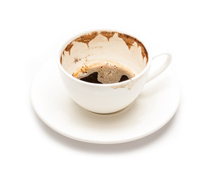 Empty used coffee cup at white background