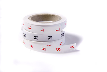fabric size tags printed on white cotton ribbon