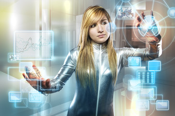 communications concept, beautiful blonde with silver latex jumps