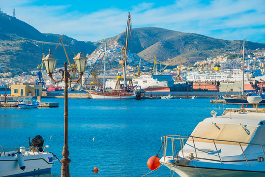 Greece Syros Island, Yachts and fishing boats into main Harbor o
