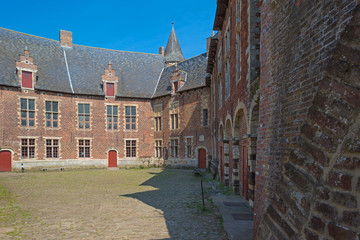 Fototapeta premium Square of a castle under a blue sky