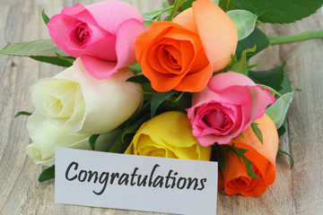 Congratulations note with colorful roses bouquet