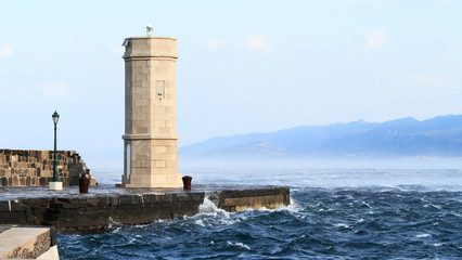 Fototapeta premium Picture represents the lighthouse while blowing strong wind