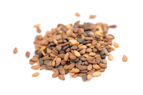 Tan Sesame Seeds Macro Isolated on White Background