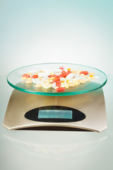 Scales with pills