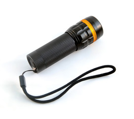 Black torchlight with strap on white background