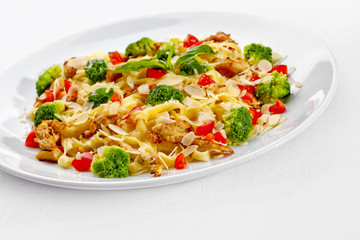 Tasty food. Pasta with vegetables.