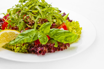 Vegetable salad  over white background. High quality image