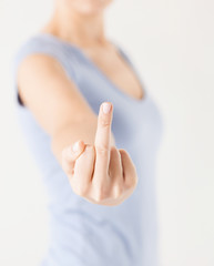 woman showing middle finger