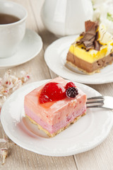 beautiful pastry, little colorful sweet cakes with tea