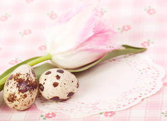 Easter eggs with bouquet pink tulips