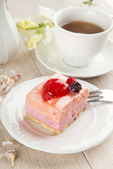 beautiful pink berries pastry, little cake with tea