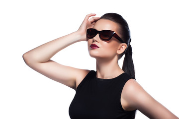 Portrait of beautiful and fashion girl in sunglasses, studio sho