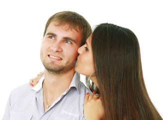 Close-up of beautiful young couple isolated on white background